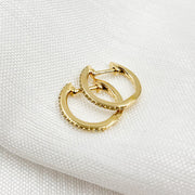 HP115334. 14K Solid Gold Diamond Huggies